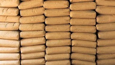 A close up of filled paper sacks in large stacks 