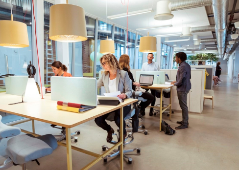 Coworkers in an open plan office