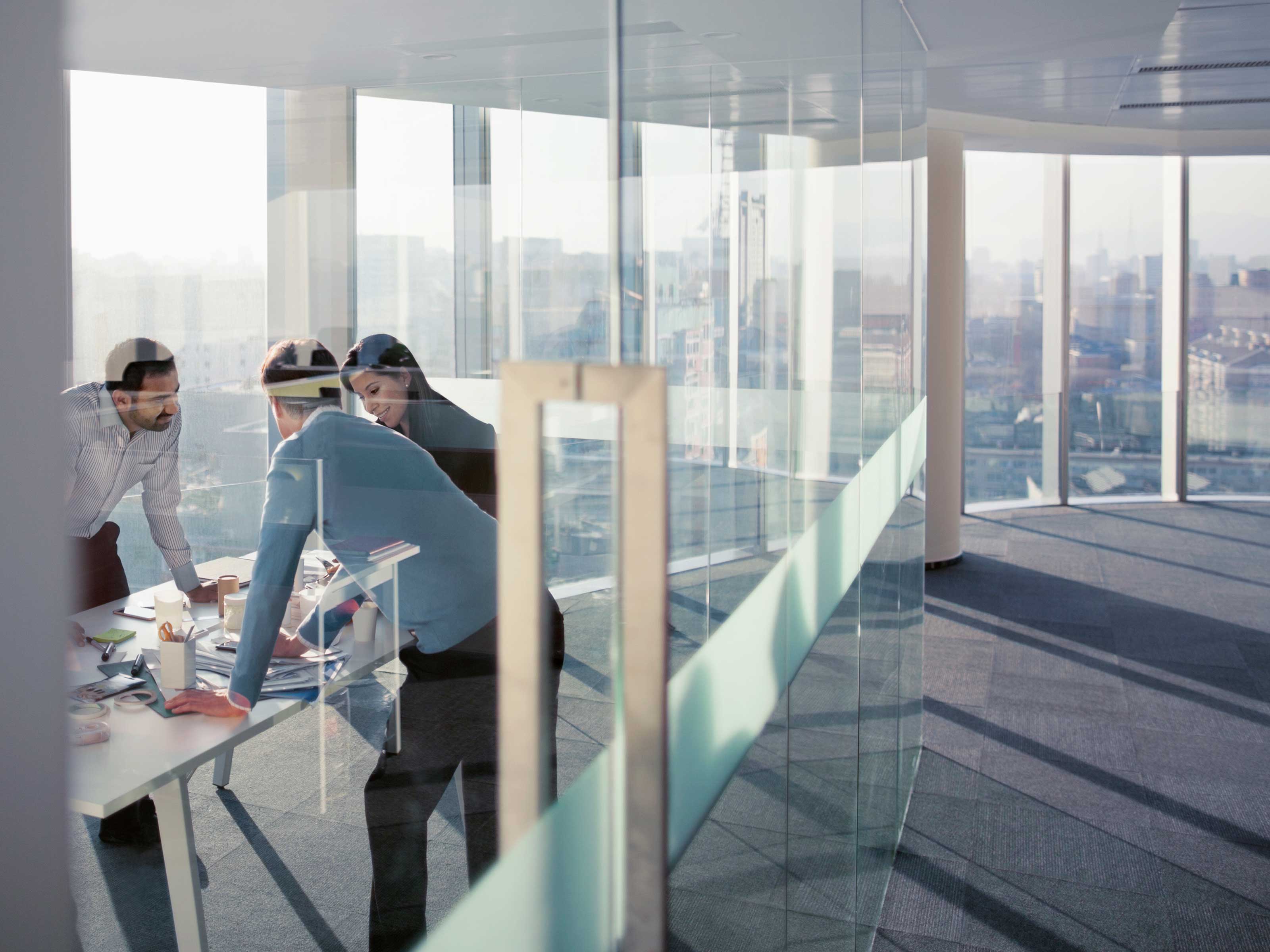 office workers meeting in high-rise building